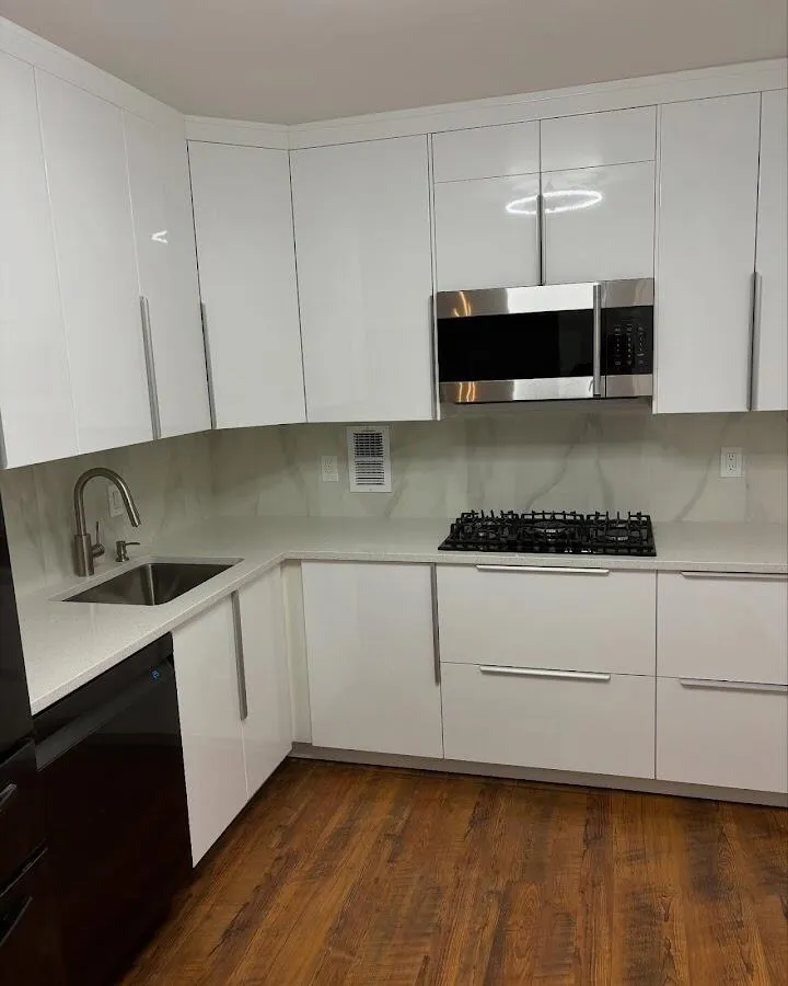 Restored kitchen with white cabinets after water damage in Sidney